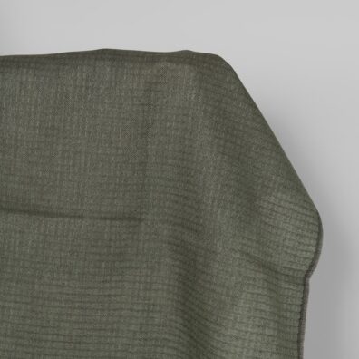 Linstoff med grønn-grått diamantmønster